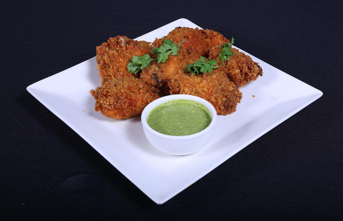 Crispy fried chicken with mint dip at Foyer